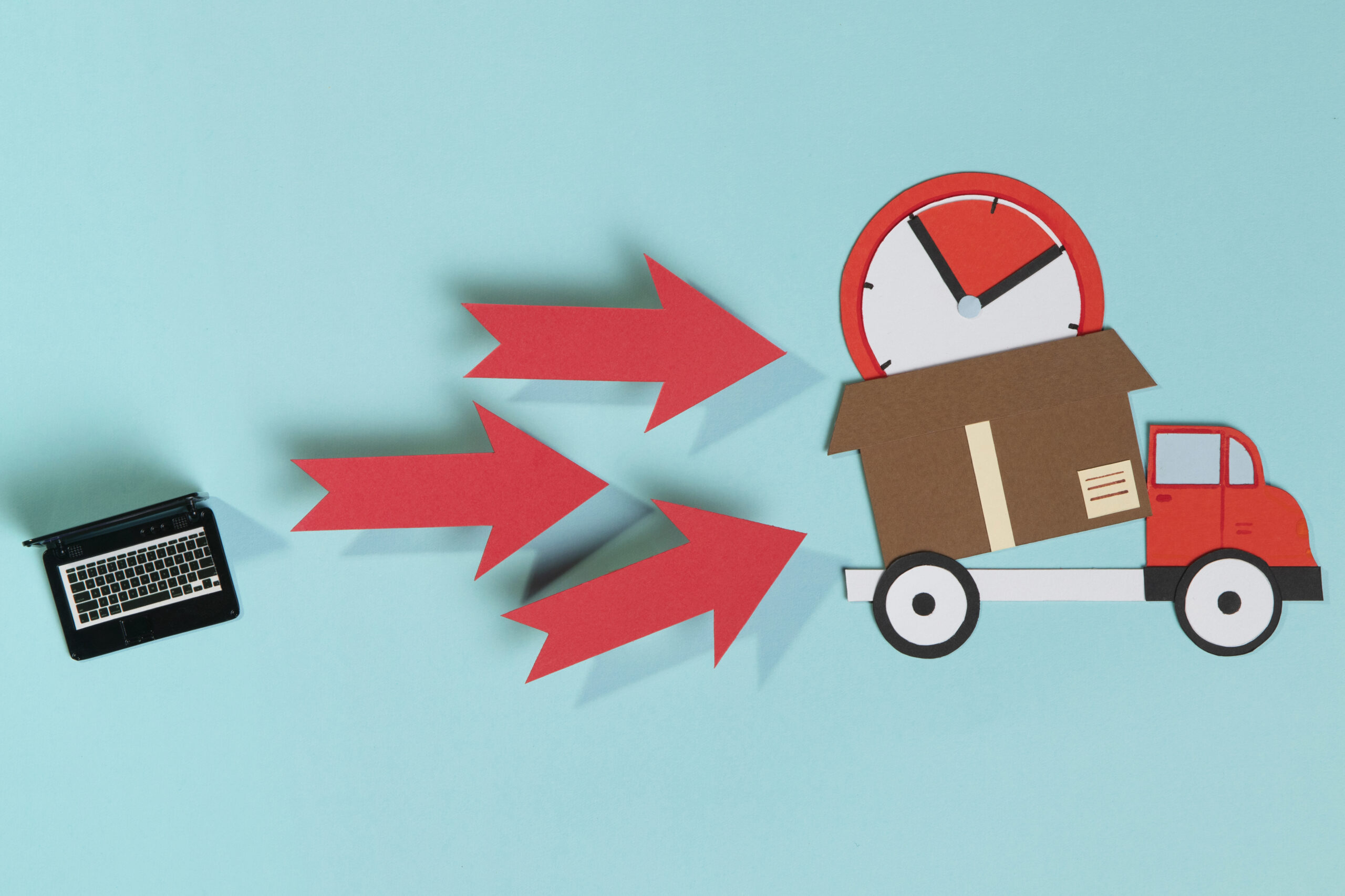 laptop-delivery-truck-with-box-scaled.jpg